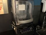 a blender that is sitting on a counter in a kitchen