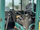 an image of a truck with a seat in the back of it