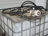 a large container of water sitting on top of a pallet