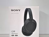 the sony headphones are in the box on the table