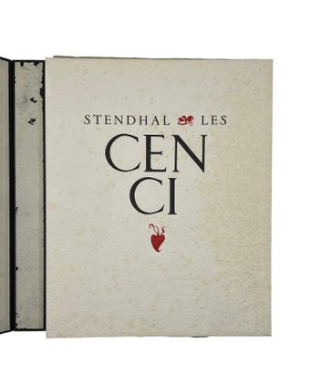 an open book with a picture of a red heart on the cover