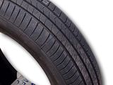 tire on a white background with a price tag on it