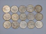 six different types of silver coins are arranged in a row