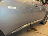 a car that has a sticker on the side of it