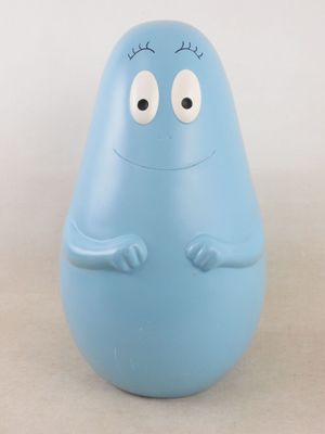 un petit objet bleu avec des yeux et des mains dessus