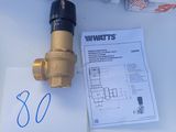 a picture of a water meter and some rolls of toilet paper