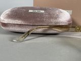glasses in a box with a pink velvet case and gold rims