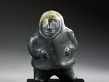 an image of a statue of a woman holding a baby