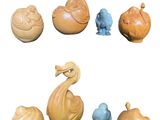 a lot of small figurines of different shapes and sizes