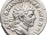 une pièce d'argent représentant la tête d'un homme coiffé d'une couronne