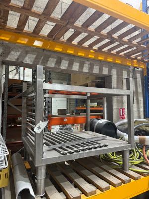 a rack with a bunch of items on it in a warehouse