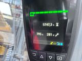 a close up of a cell phone with a green screen