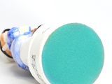 an image of a close up of a toothbrush with a blue sponge
