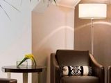 two chairs and a table in a room