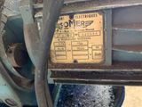 a close up of a machine with a number plate on it