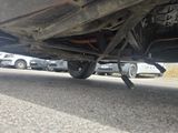a close up view of a car ' s exhaust pipe
