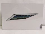 La boîte est blanche et comporte l'image d'un iPad à l'intérieur.