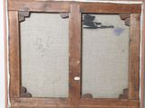 an old picture of a window frame with a picture on it
