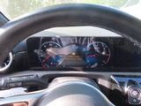 a picture of a car dashboard with a digital gauge