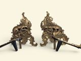 pair of antique brass figurines of lions and swords