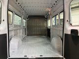 a white van that is parked inside of a building