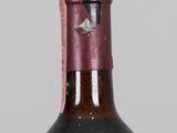 a bottle of wine that is sitting on a table
