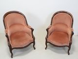 pair of antique french style chairs with pink velvet upholstered seats