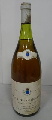 a bottle of wine that is sitting on a table