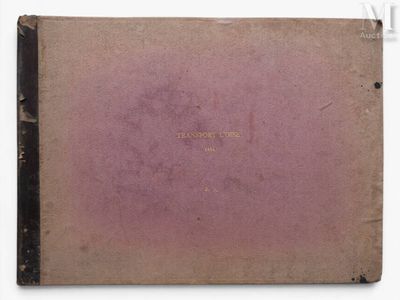 a close up of a book with a purple cover on a white surface