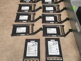 several hard drives are lined up in a row on the floor