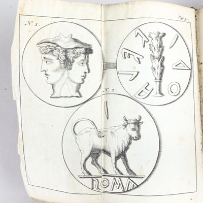 un vieux livre avec des dessins représentant une chèvre et un homme