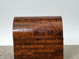 a small wooden box sitting on top of a table