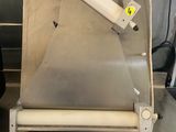 a machine that is sitting on a table in a kitchen