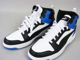 a pair of black and white sneakers with blue accents