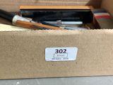a box with some tools inside of it on a table
