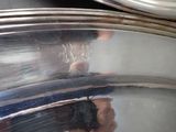 a person taking a picture of the reflection of a person in a mirror