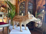 a fake boar that is standing on top of a table