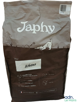a bag of dog food that is sitting on a table