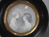a picture of a woman and a child in a picture frame