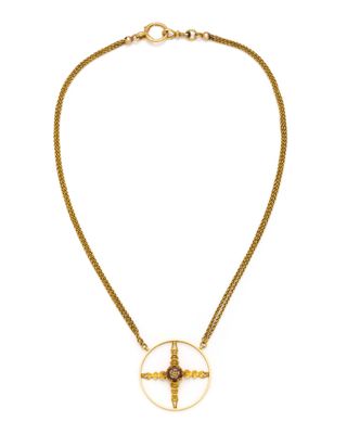 a gold necklace with a cross on a chain