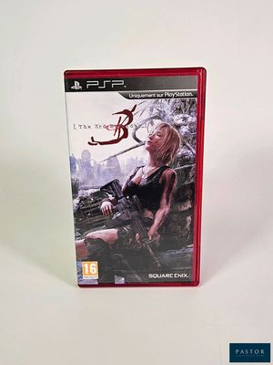 La boîte du jeu vidéo Resident Evil repose sur une surface blanche.