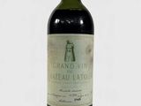 a bottle of wine that is sitting on a table