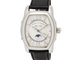 une image représentant une montre-bracelet avec un cadran blanc et un bracelet en cuir noir