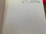 a book that is open on a wooden table