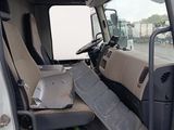 a white truck with a seat that has been vandalized