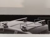 an image of a car with a roof rack attached to it ' s roof