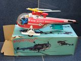 a toy helicopter that is sitting on top of a box