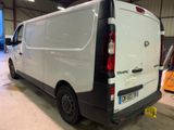 a white van that is parked in a garage
