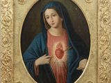 une image représentant un tableau où l'on voit une femme tenant un cœur