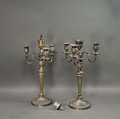 pair of silver plated candelabs with candlesticks on stands